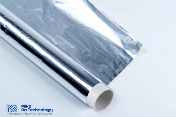 Rolling foil onto the PVC pipe